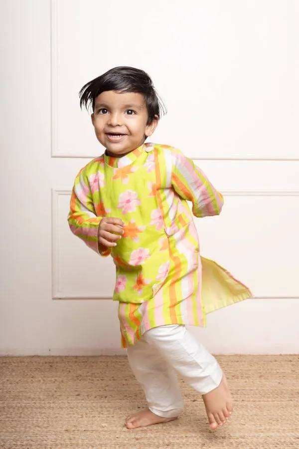 Bright lime green floral printed kurta with off-white pants, a fun and vibrant choice for your little one’s festive wardrobe