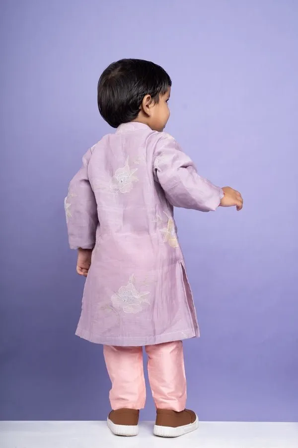 Charming lavender kurta with delicate floral embroidery paired with Peach pants, perfect for festive occasions