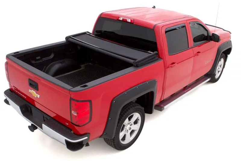 Lund Genesis Elite Tri-Fold Tonneau Cover Vinyl Black 5.5 ft Bed - Dodge Fullsize Truck 2002-15